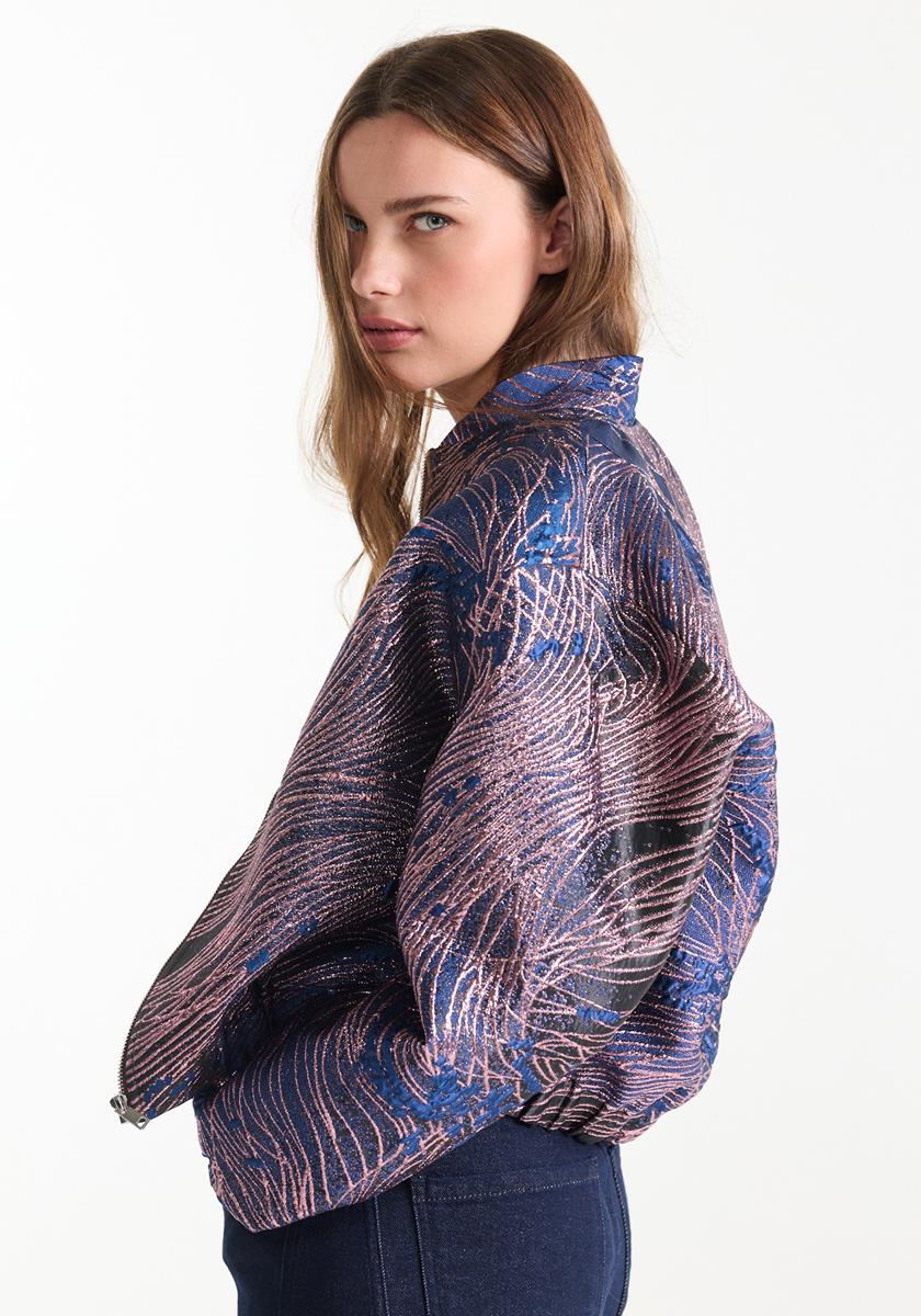 Aster Blauw jasje met glanzend dessin