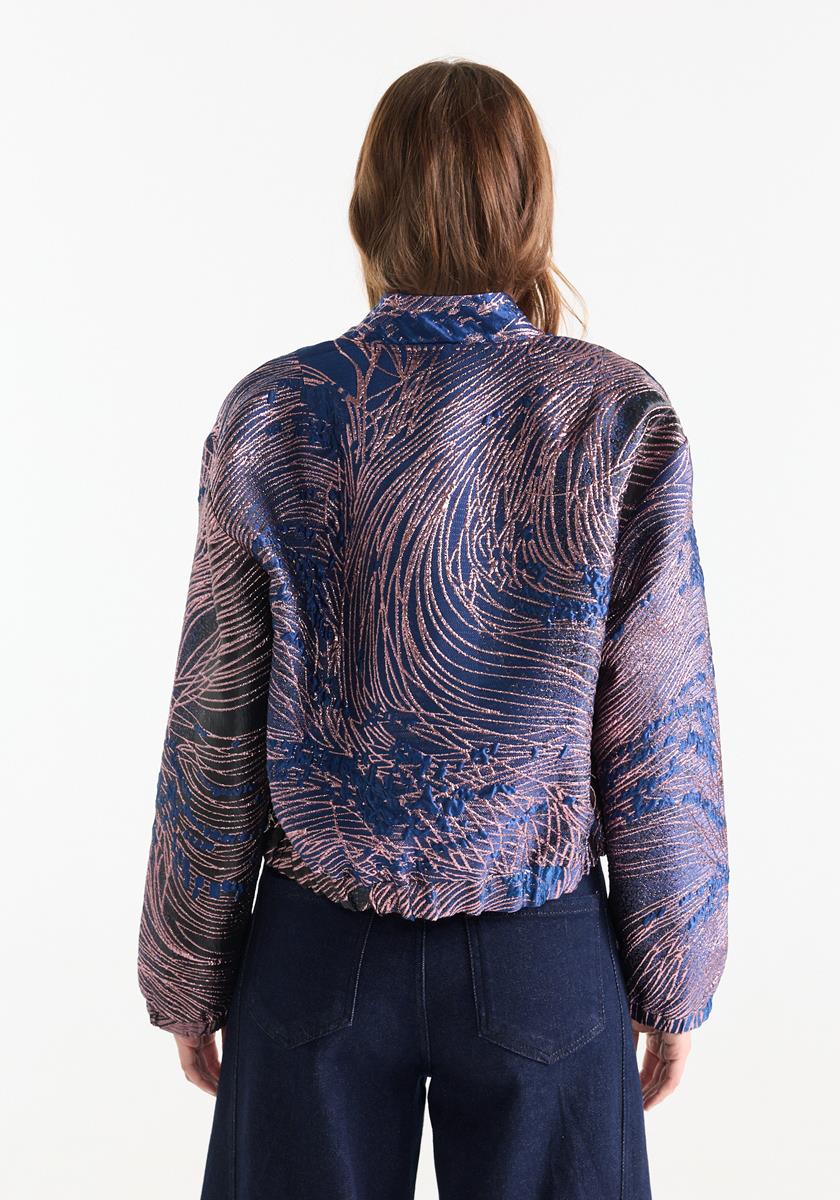 Aster Blauw jasje met glanzend dessin