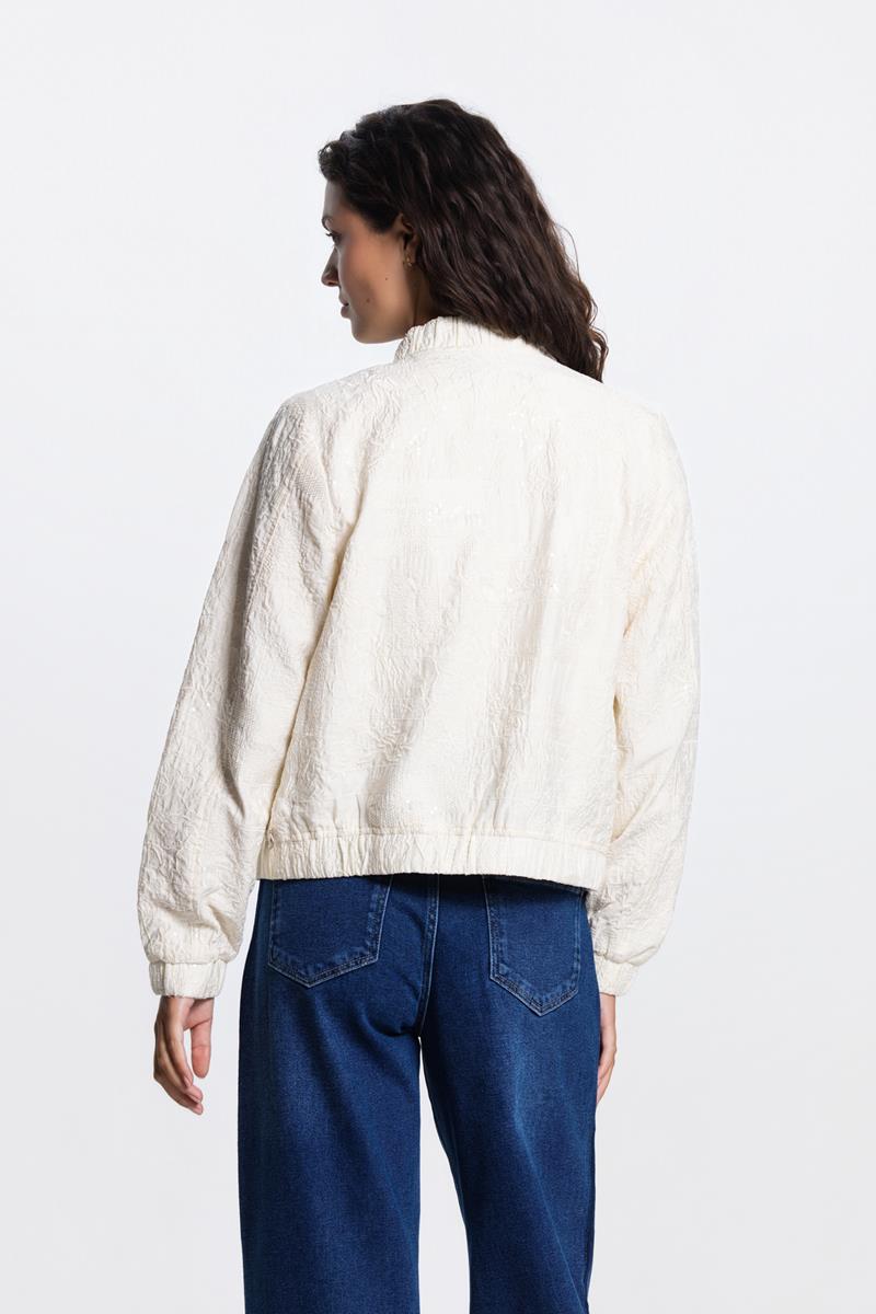 Shanti bomberjasje met glitterdetail – Cream