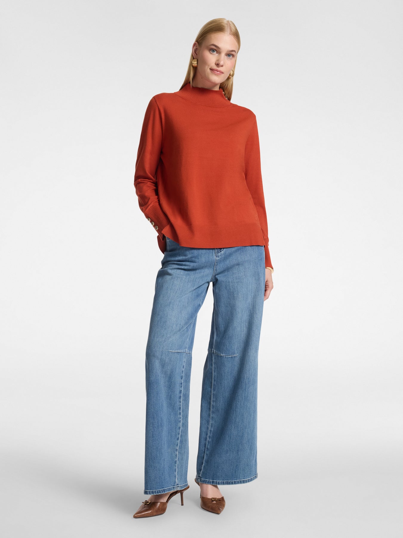 Flared jeans met details